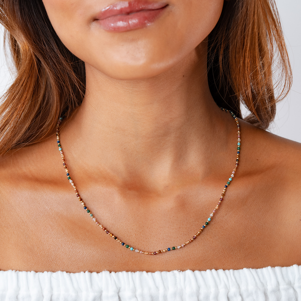 Dainty necklace with assorted multi-color stones and gold beads