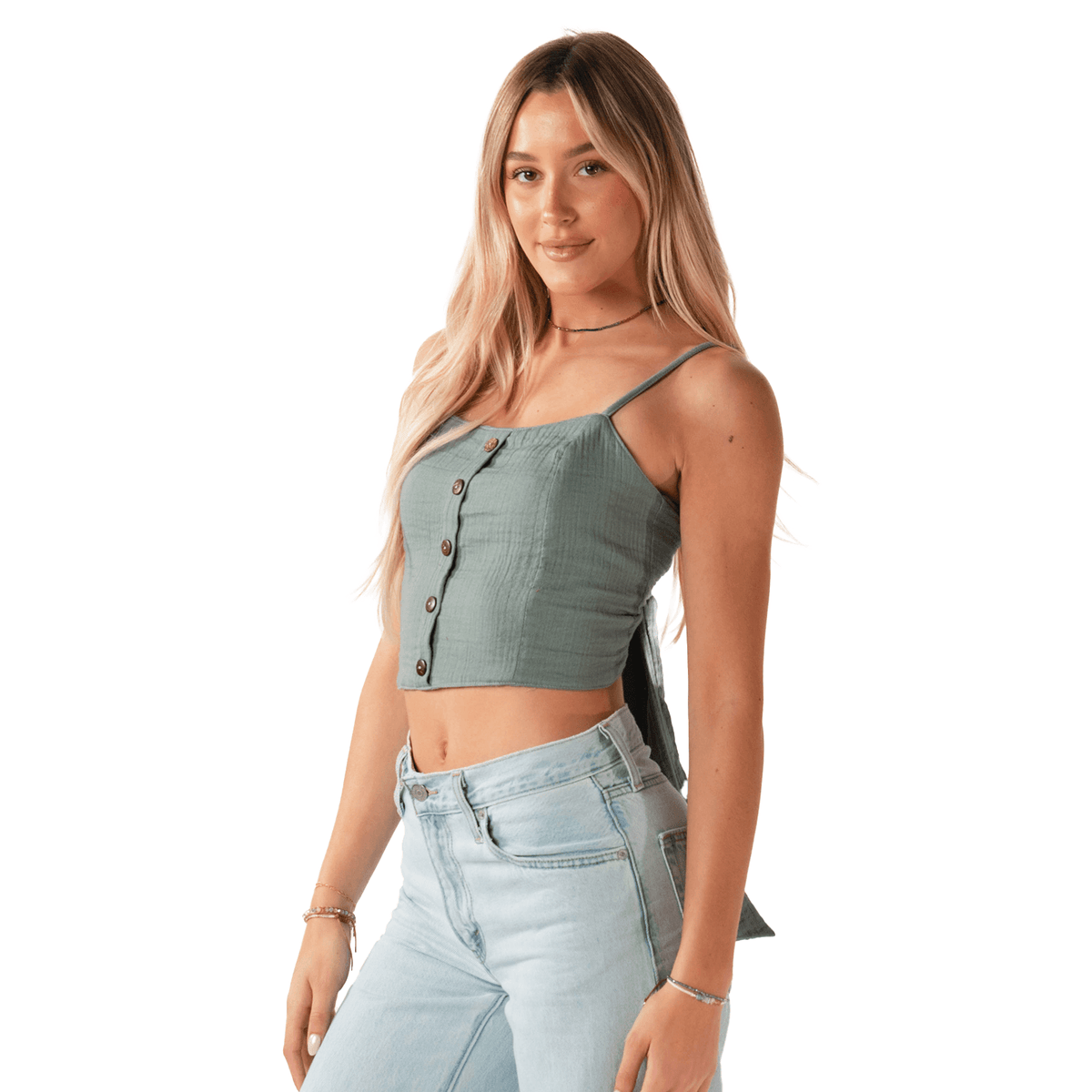 Model wearing sage colored tank top with front button detailing