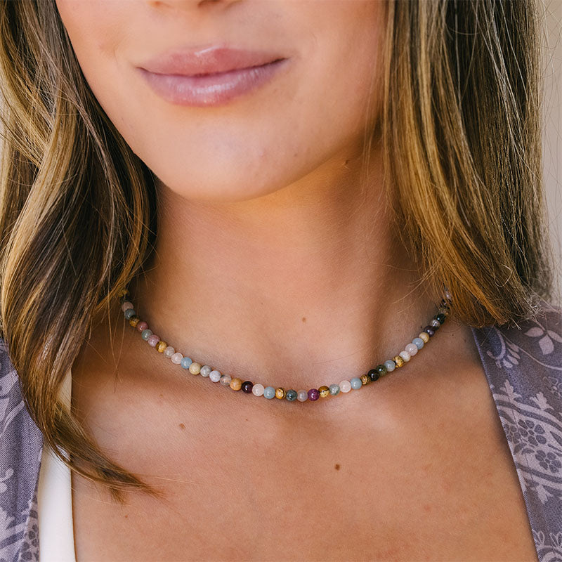 Peace + Happiness 4mm Healing Necklace, worn on neck close-up