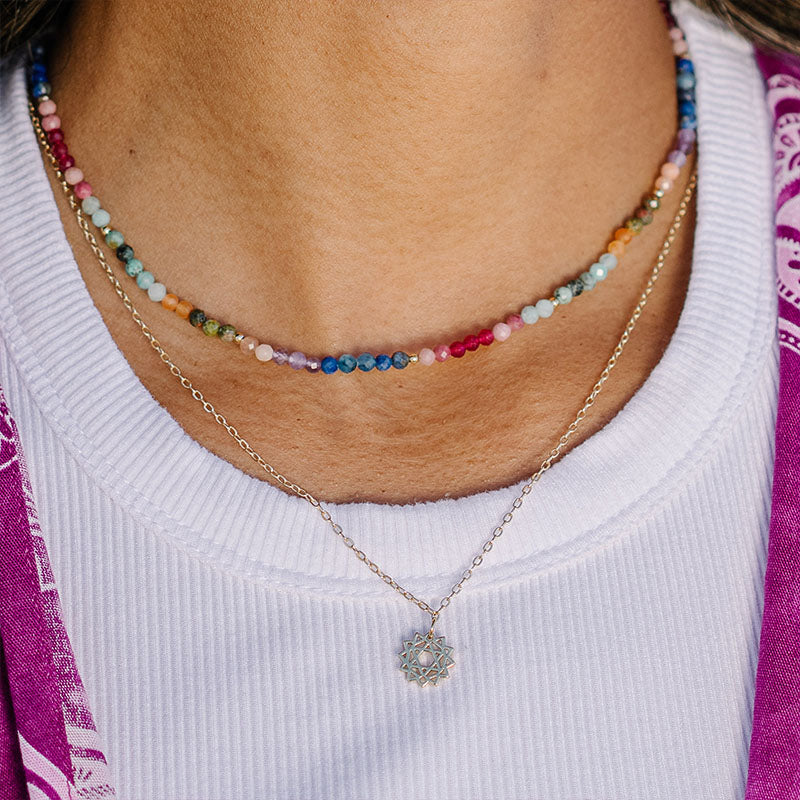 3mm Good Vibes + Heart Chakra Necklace Stack, worn layered on chest