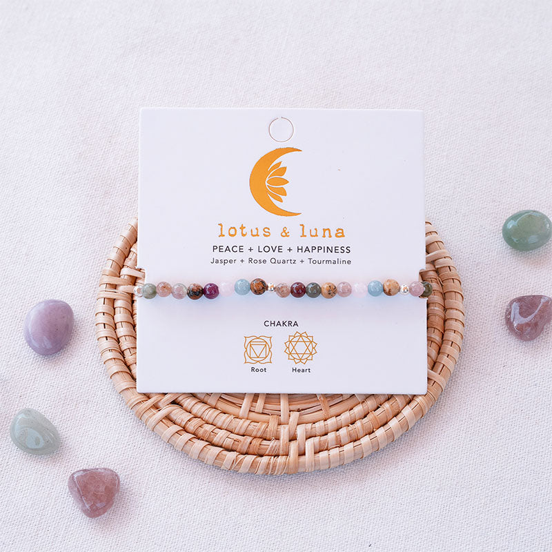 Peace + Love + Happiness 4mm Healing Bracelet, on brand card with crystals