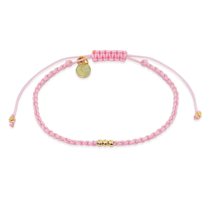 Breast Cancer Research Charity Bracelet, flat lay gold beads