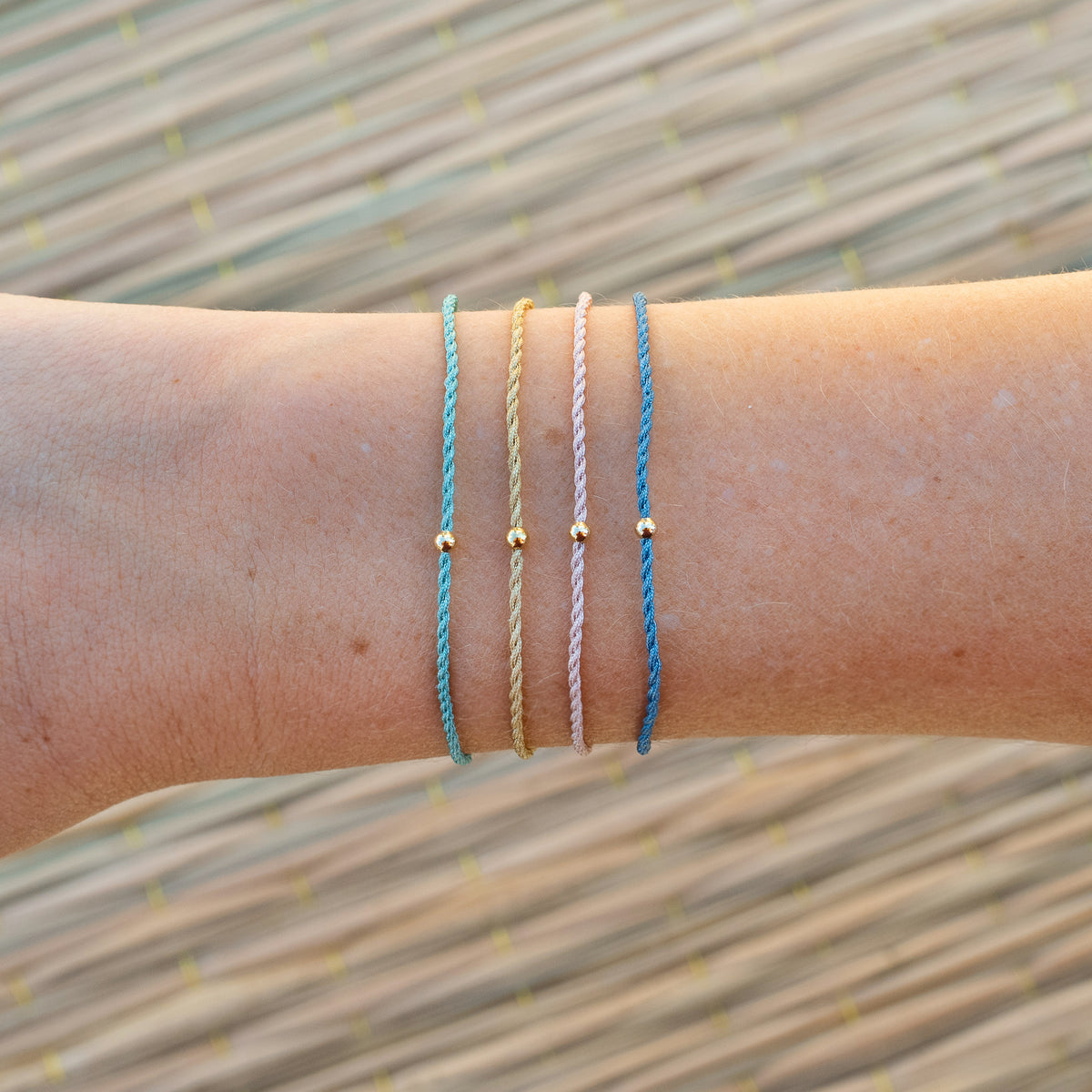Smile Pass It On Bracelet, stacked on wrist