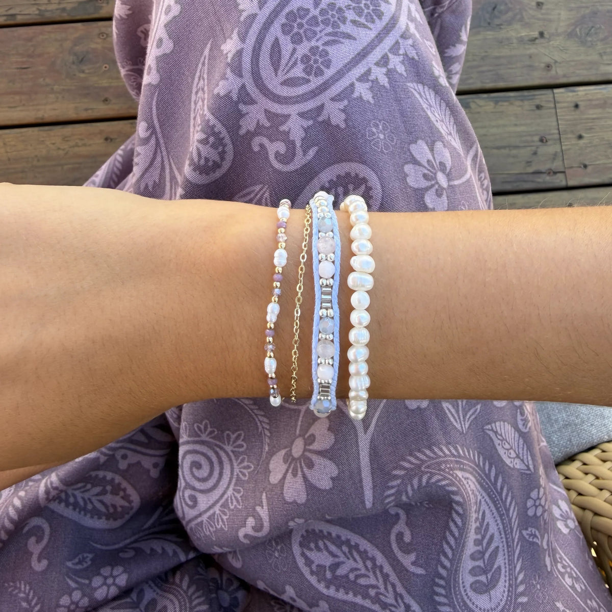 Self Love 4mm Healing Bracelet, stacked on wrist with purple paisley