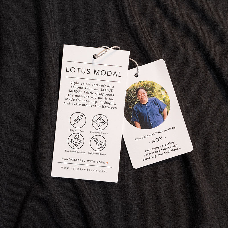 Lotus Modal hang tags on black modal fabric