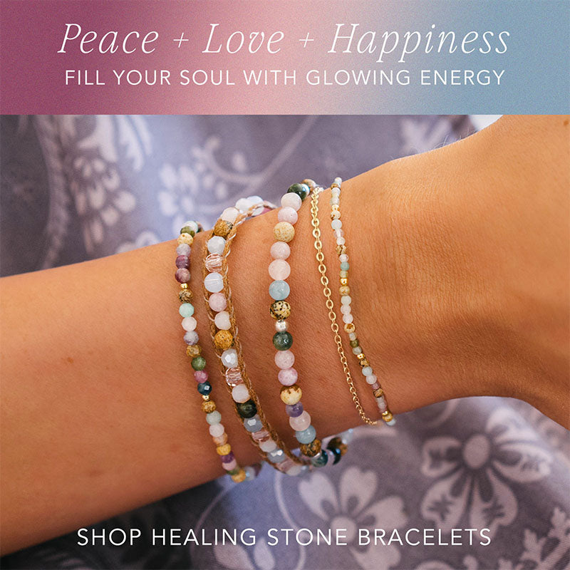 Peace + Love + Happiness healing stone bracelets stacked on wrist, promotional graphic