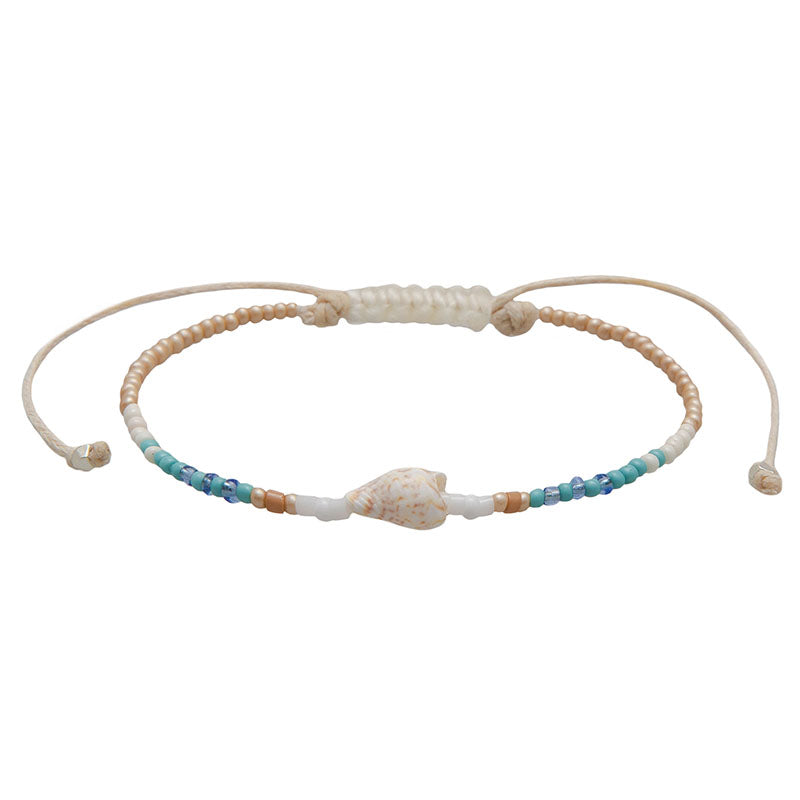 Rolling Tides Seedbead Bracelet, flat lay with shell bead