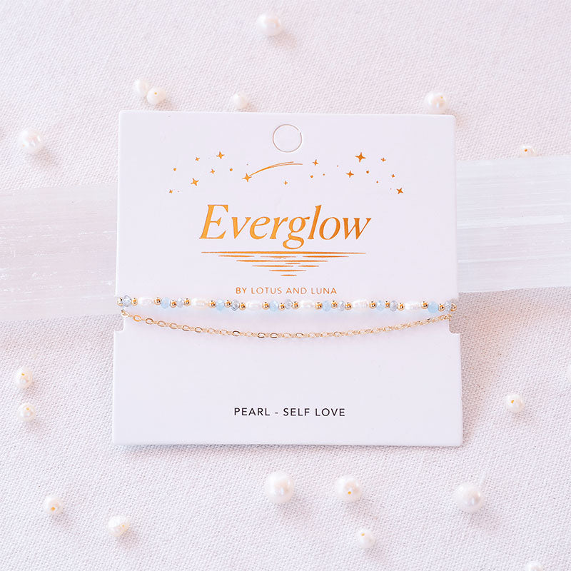 Celeste Everglow Bracelet, on card with selenite